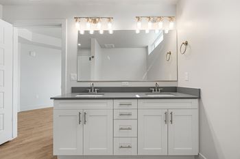 Bathroom with large mirror